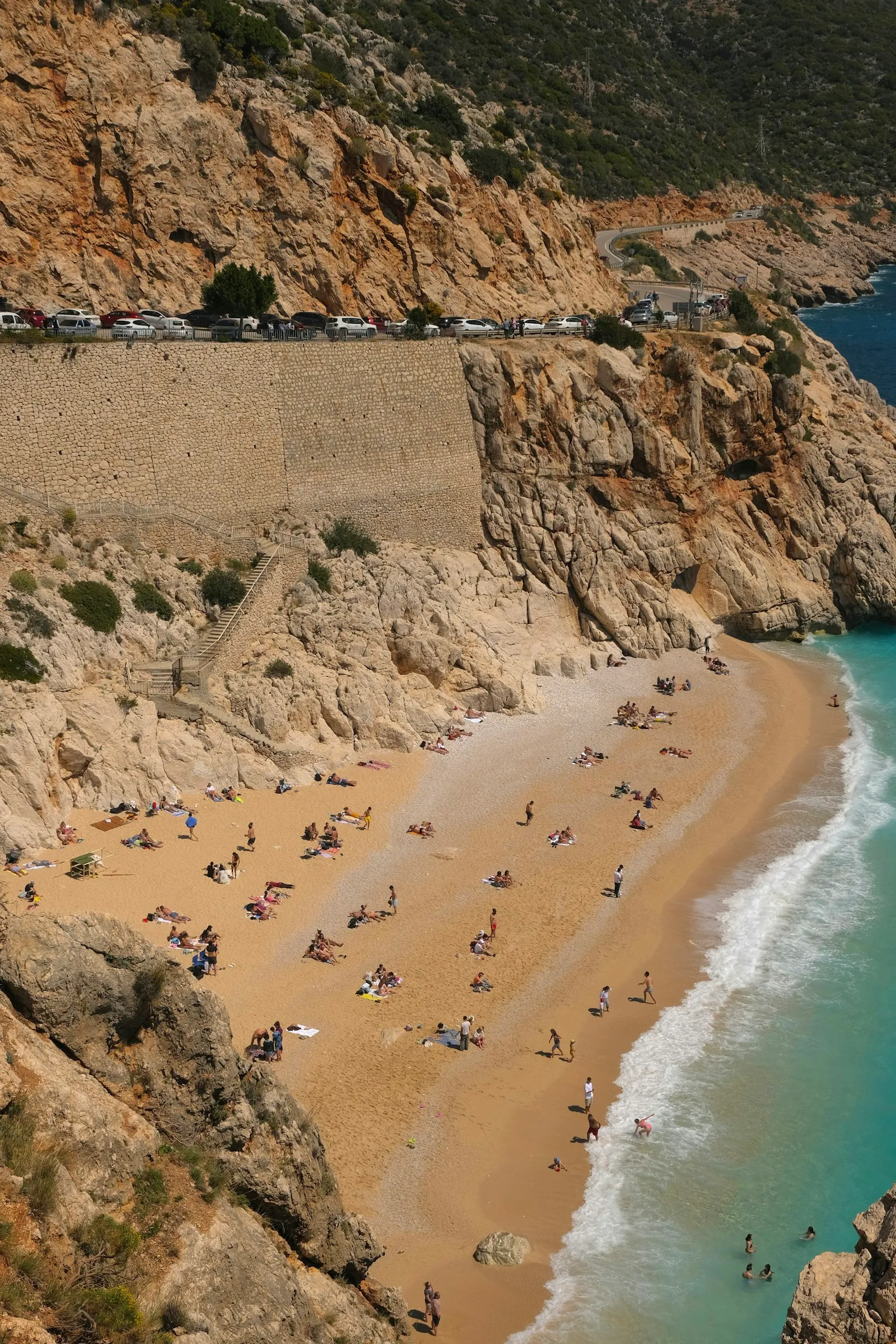 Kalkan Boat Tour — The classic Kalkan boat trip: a full day aboard a traditional wooden gulet leaving directly from Kalkan harbour, with six swim stops in clear coves you can't reach by road